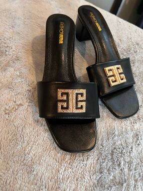 FashionNova Black Kitten Heels with Gold Emblem